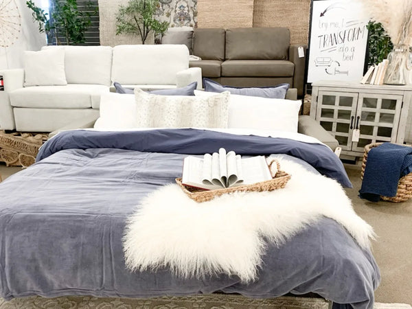Custom Canadian-made sofa beds display inside the Showhome Furniture Victoria showroom