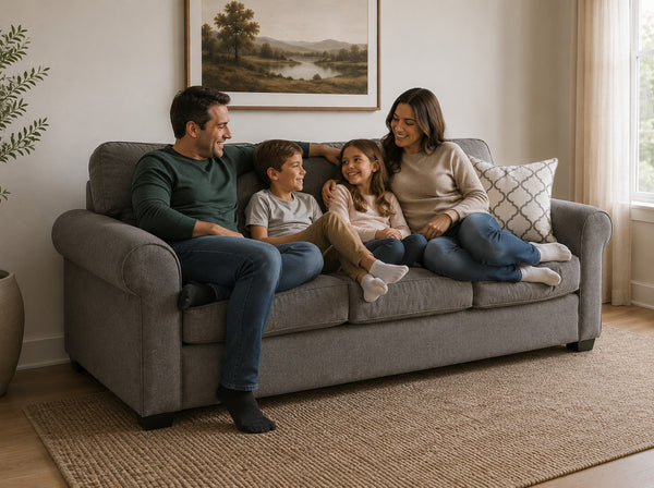 Family lounging together on a three-seater sofa bed in Victoria