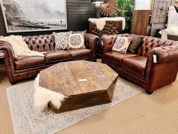 Leather sofa displayed in a Victoria furniture showroom