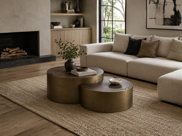 Modern nesting coffee table set with warm metallic finish styled in a Victoria home