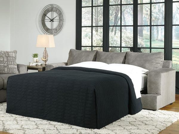 Queen sofa sleeper with memory foam pull-out bed styled in a Victoria living room